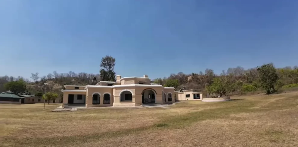 Bijrani Forest Lodge in Jim CorbettNational Park surrounded by sal forest and wildlife habitat.