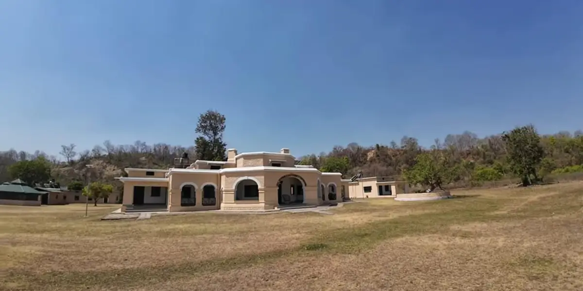 Bijrani Forest Lodge in Jim CorbettNational Park surrounded by sal forest and wildlife habitat.
