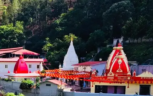 Best places to visit in Jim Corbett nearby region featuring the peaceful Kainchi Dham Ashram dedicated to Neem Karoli Baba.