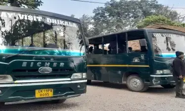 Group of Dhikala canter safari vehicles parked at Dhangarhi gate entrance of Dhikala zone, Jim Corbett National Park.