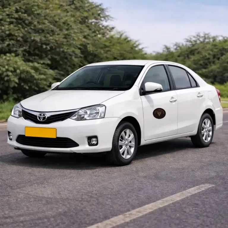 Comfortable Toyota Etios sedan car available for private taxi transfers and hotel pickups in Ramnagar and Jim Corbett.